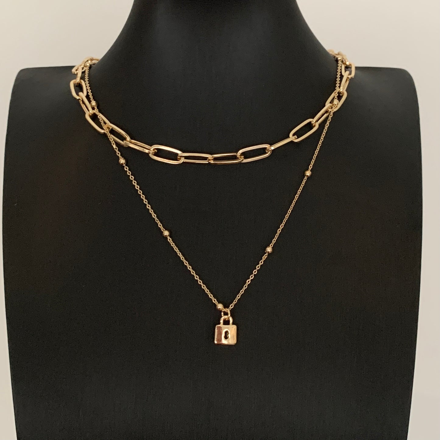 Collar DOBLE de baño de oro con dije de CANDADO
