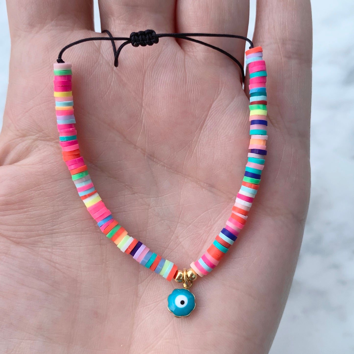 Pulseras ajustables de COLORES con OJITO