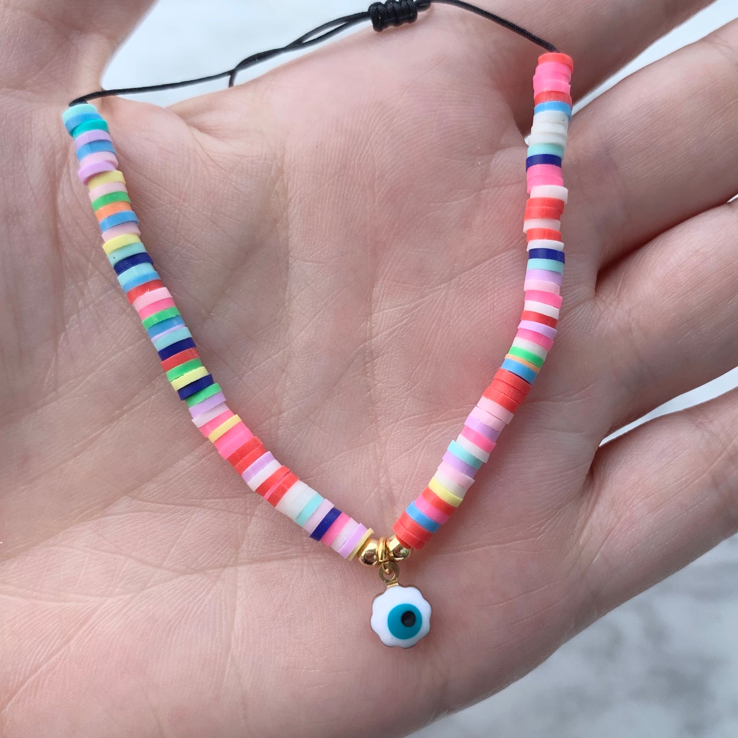 Pulseras ajustables de COLORES con OJITO