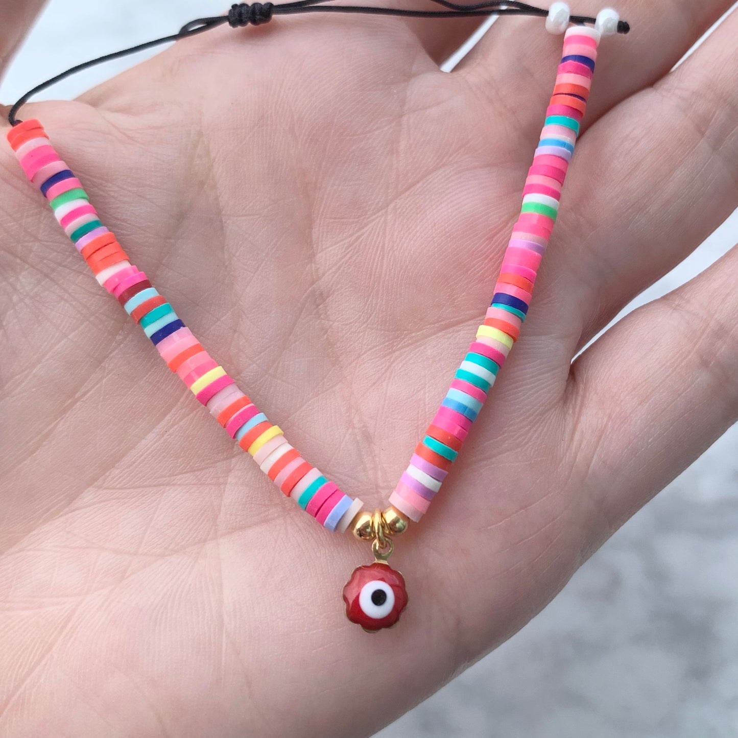 Pulseras ajustables de COLORES con OJITO