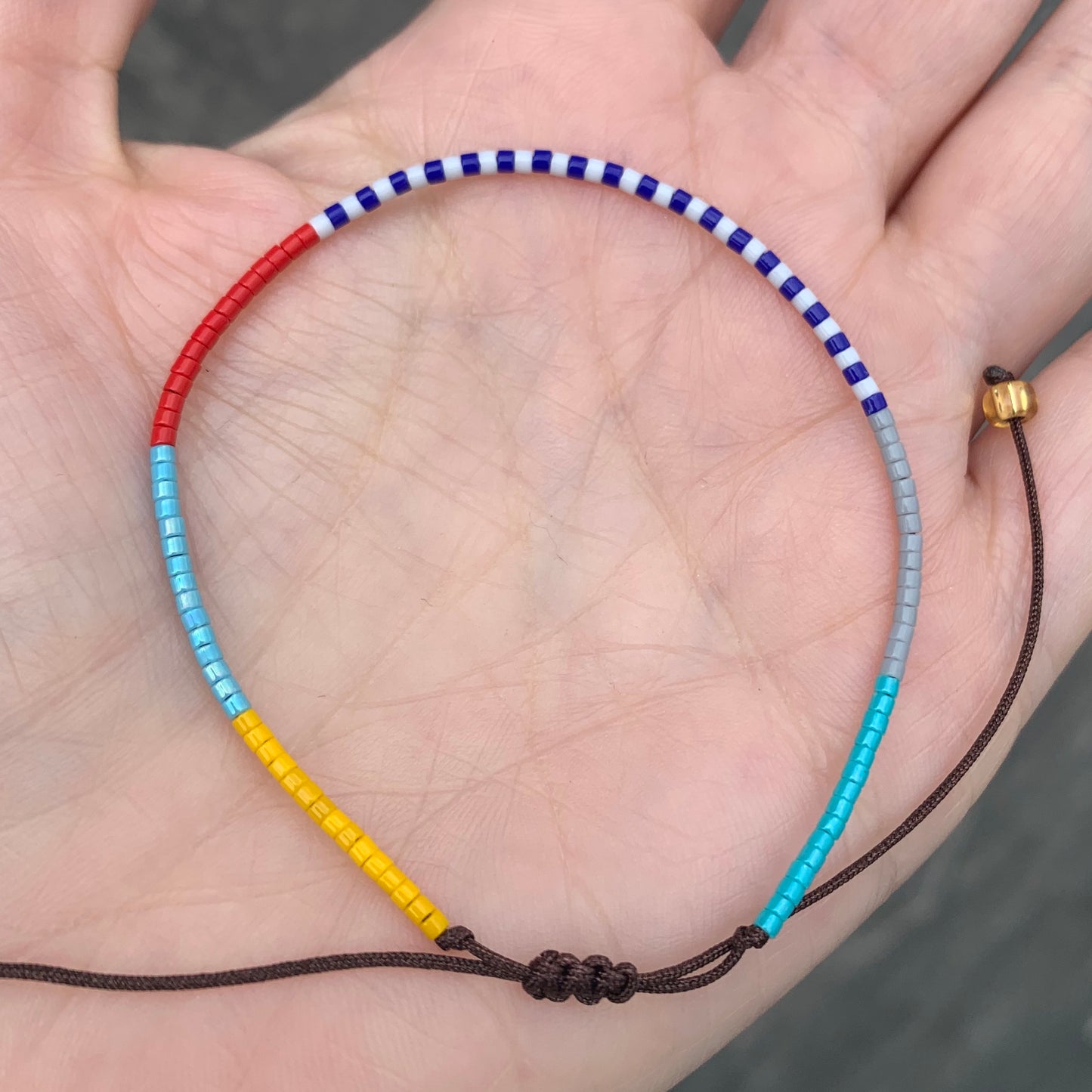 Pulsera de chaquiras de COLORES