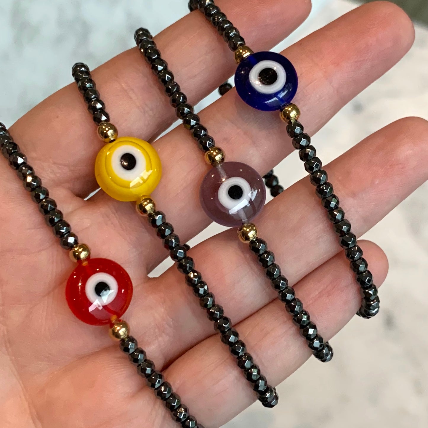 Pulsera de HEMATITA con OJITO