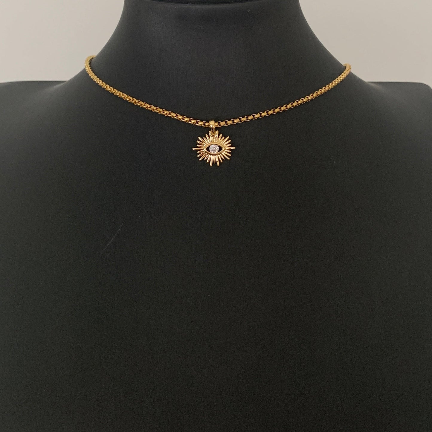Choker de acero con SOL y OJITO de color