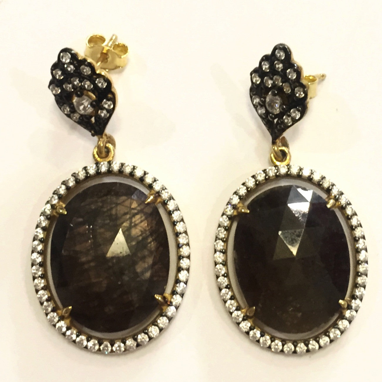 Aretes de topaz y zafiro