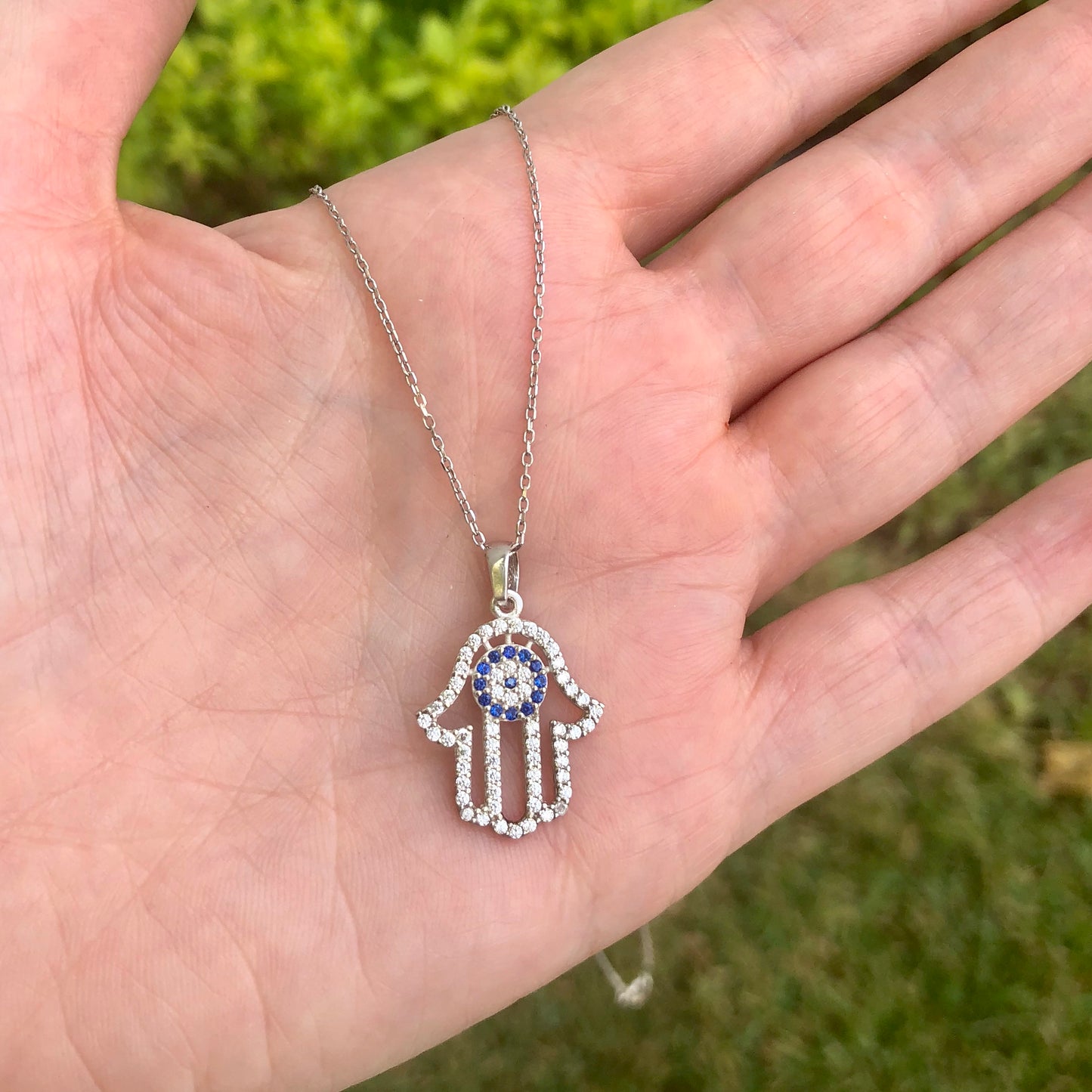 Cadenita de plata con DIJE de MANO HAMSA y OJITO