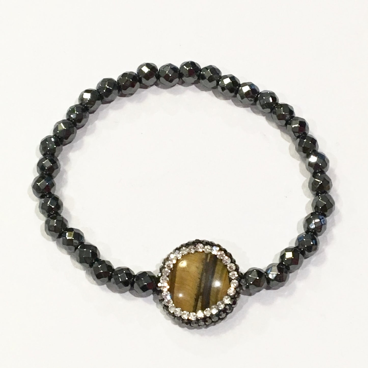 Pulsera de piedra HEMATITA con dije de piedra OJO DE TIGRE con cristales