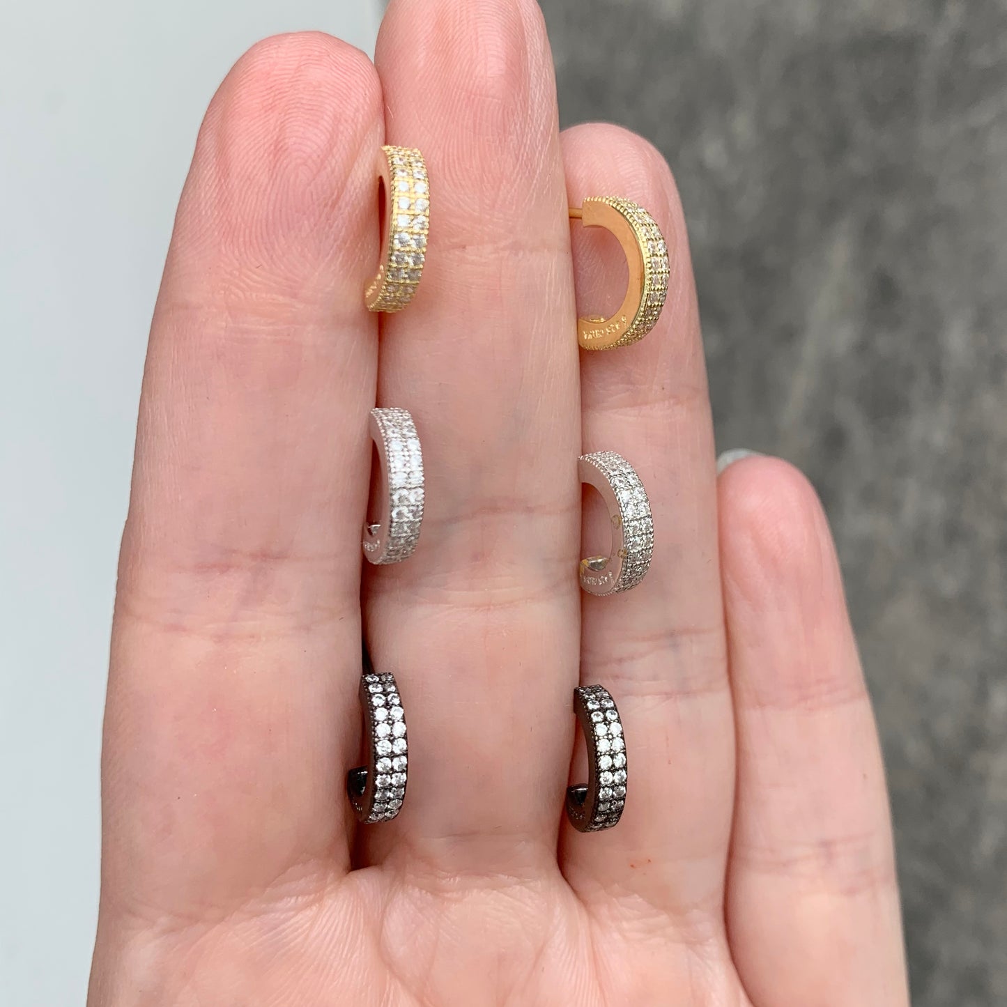 ARRACADAS incompletas de plata con ZIRCONIAS