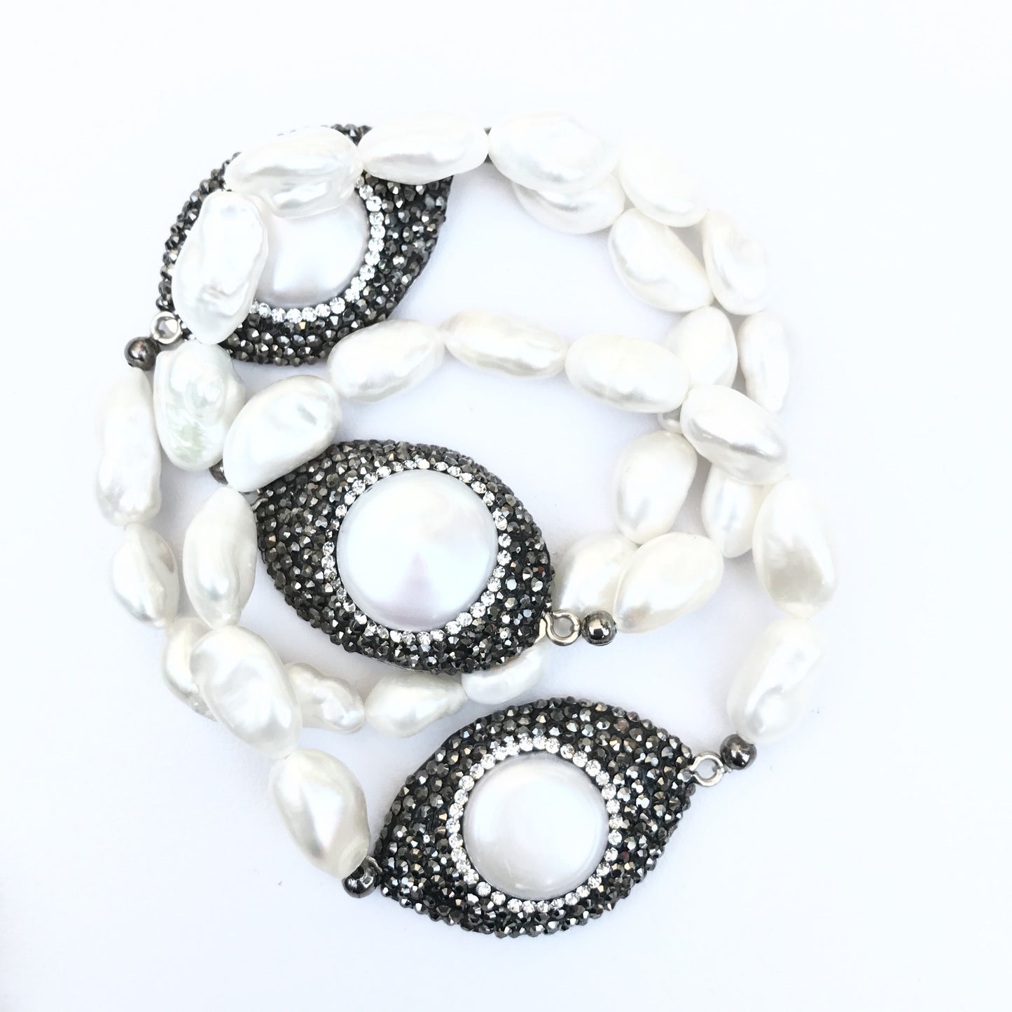 Pulsera de PERLAS con OVALO PLANO DE HEMATITA CON PERLA
