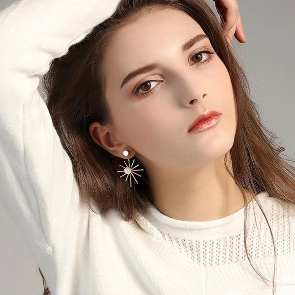 Aretes con PICOS dorados y PERLA