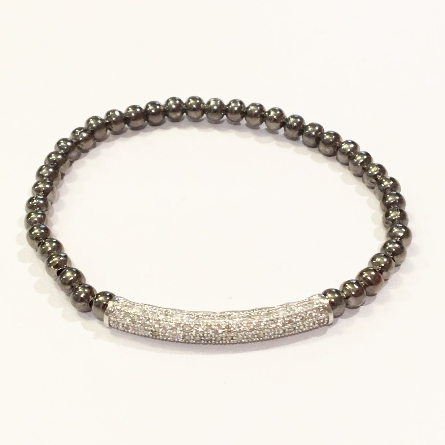 Pulsera de BOLITAS de acero con BARRA CHICA de zirconias