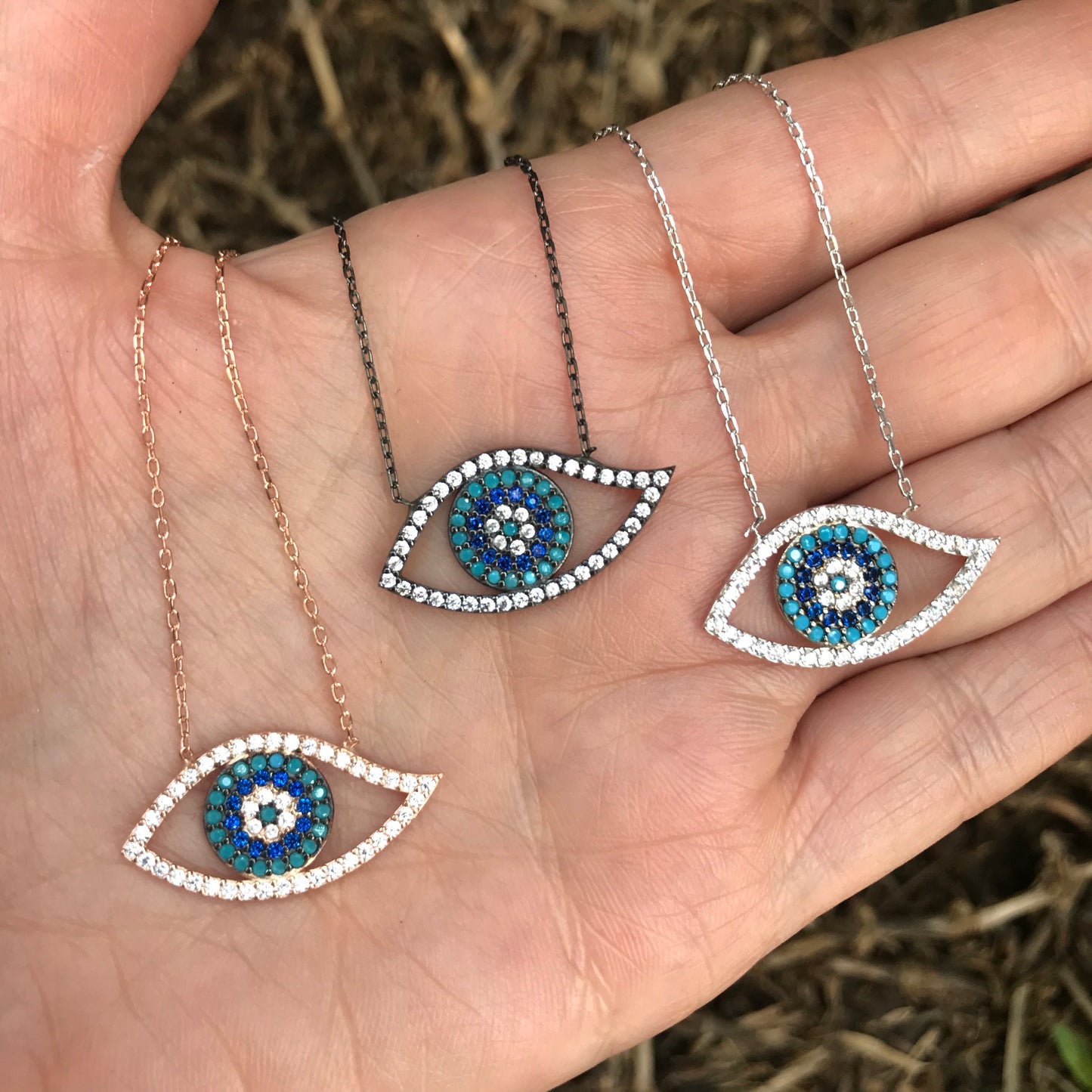 Cadenita de plata .925 con OJITO OVALADO HUECO con TURQUESAS y ZAFIROS