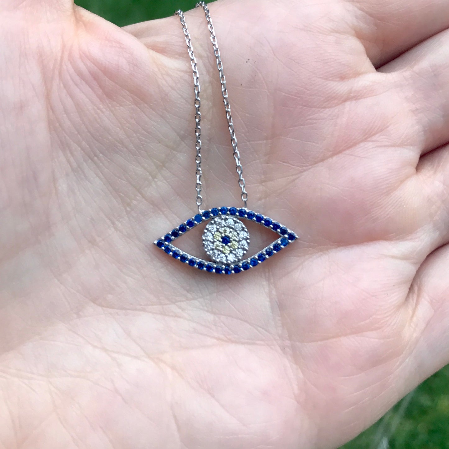 Cadenita de plata .925 con OVALO HORIZONTAL HUECO con OJO