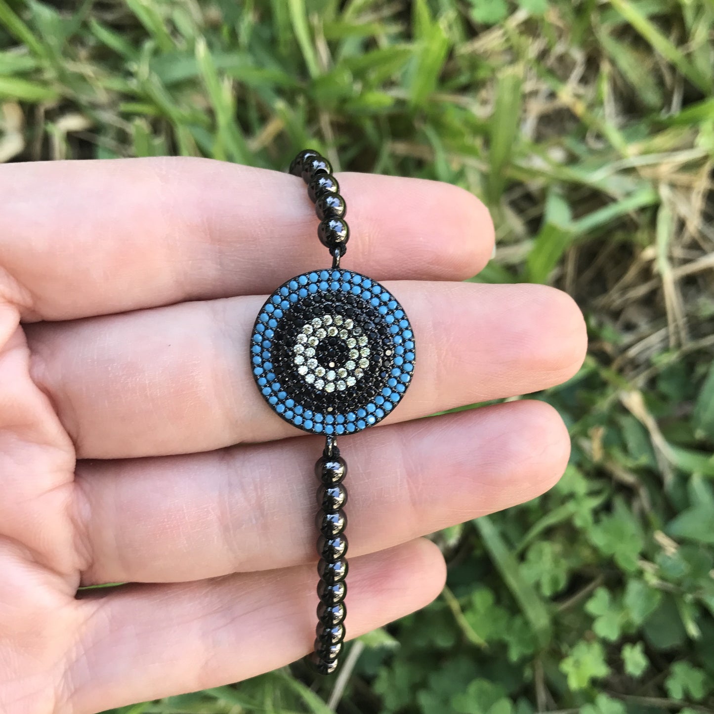 Pulseras AJUSTABLES de bolitas de ACERO INOXIDABLE NEGRAS con CIRCULO con OJO