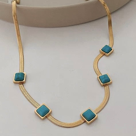 Cadena PLANA de acero inoxidable con CUADRITOS turquesa