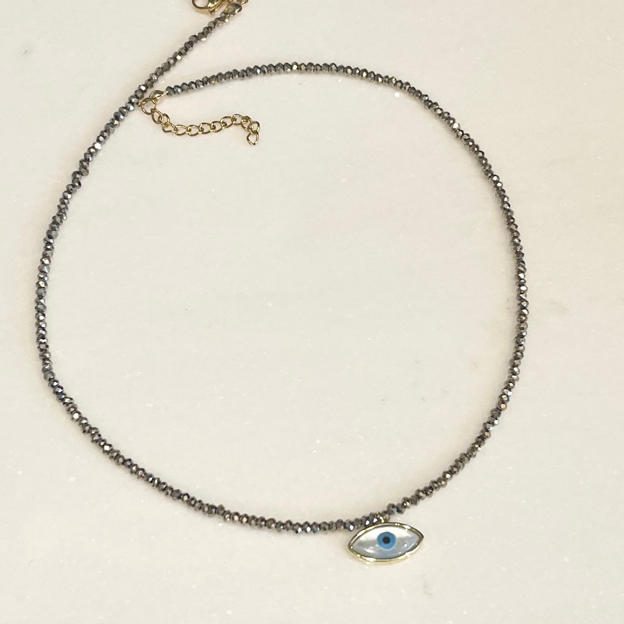 Collar con dije de OJO