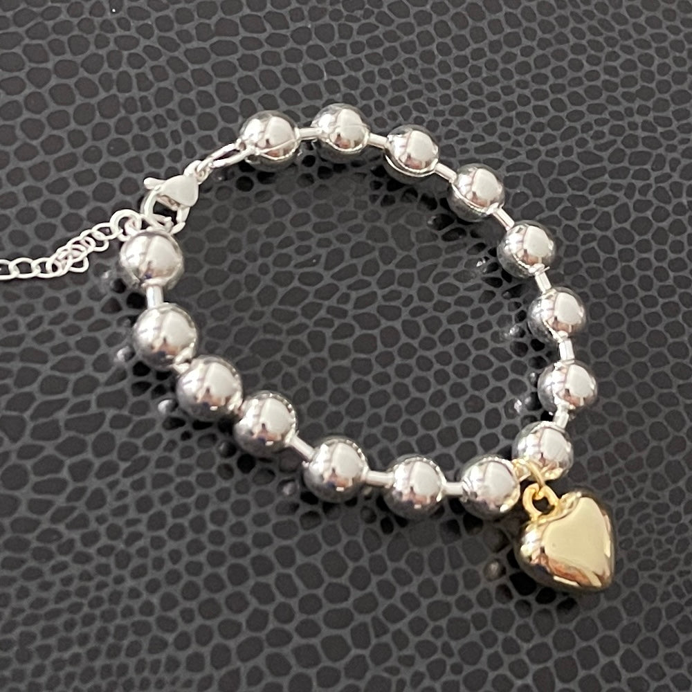 Pulsera de plata con dije de CORAZON