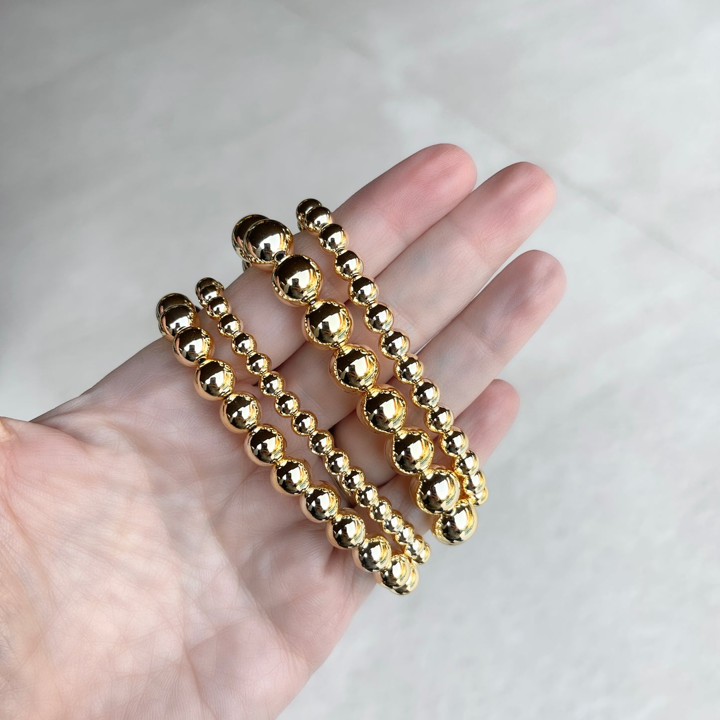 Pulseras elásticas DORADAS