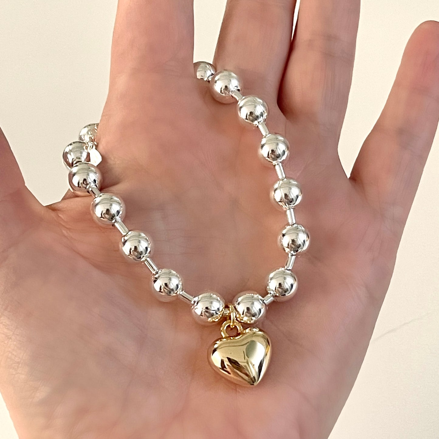 Pulsera de plata con dije de CORAZON