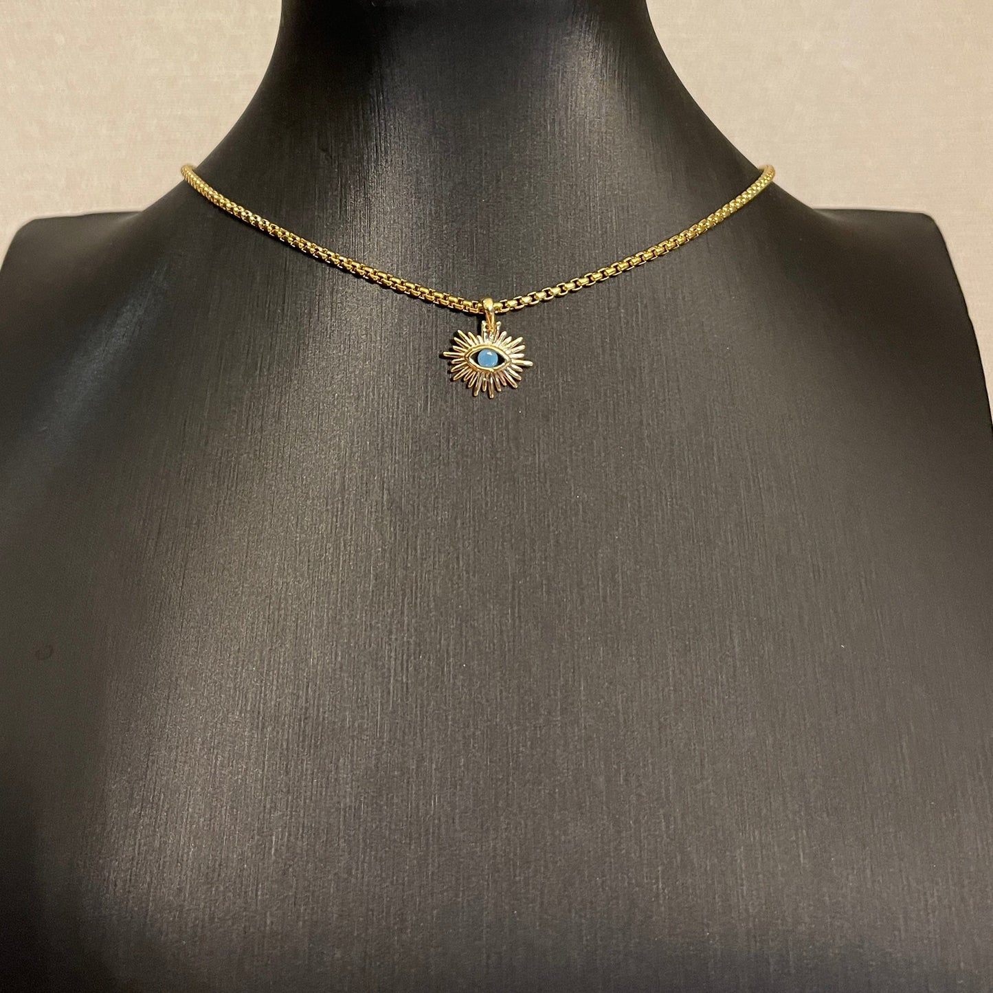 Choker de acero con SOL y OJITO de color
