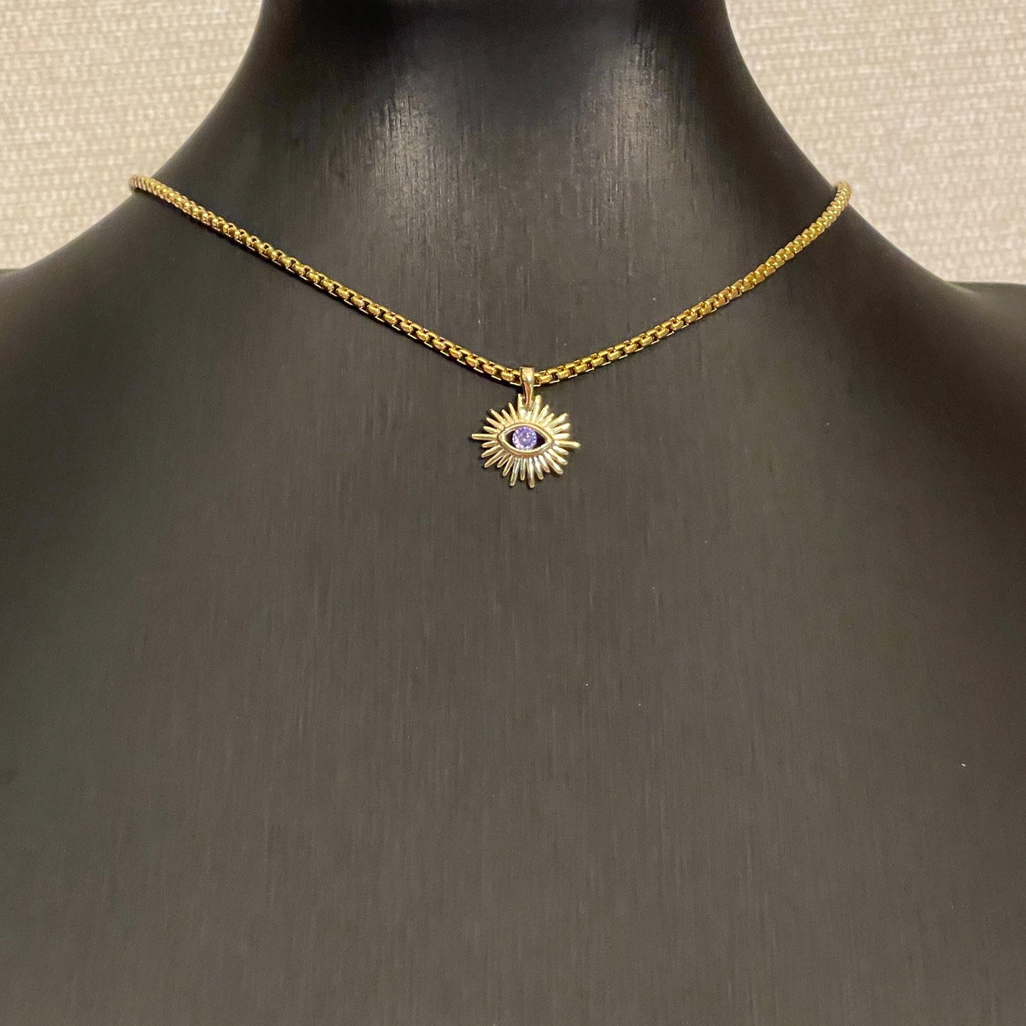 Choker de acero con SOL y OJITO de color
