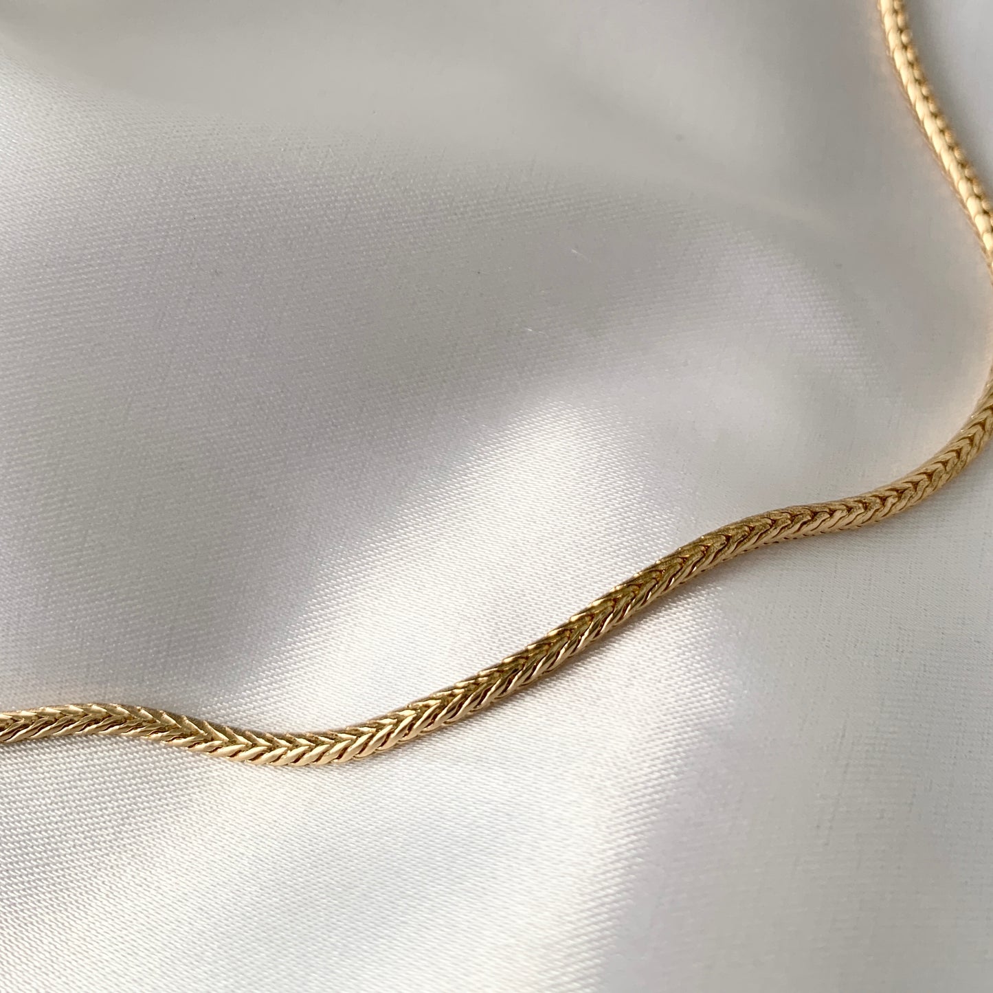 Cadenita TORCIDA de baño de oro