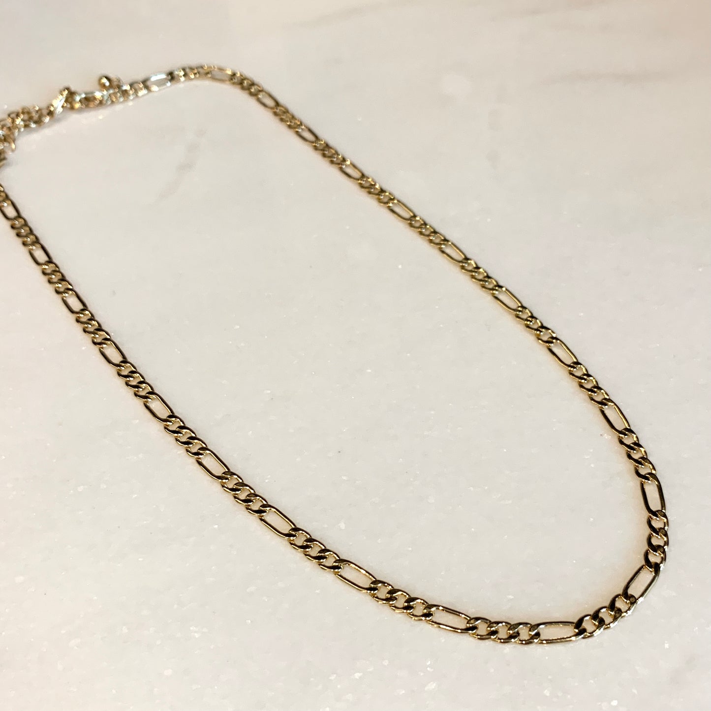 Cadenita de baño de oro