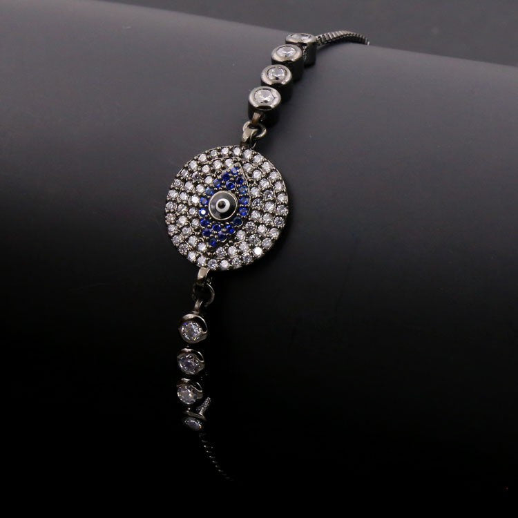 Pulsera Ajustable de CIRCULO con OJO en NEGRO con zirconias