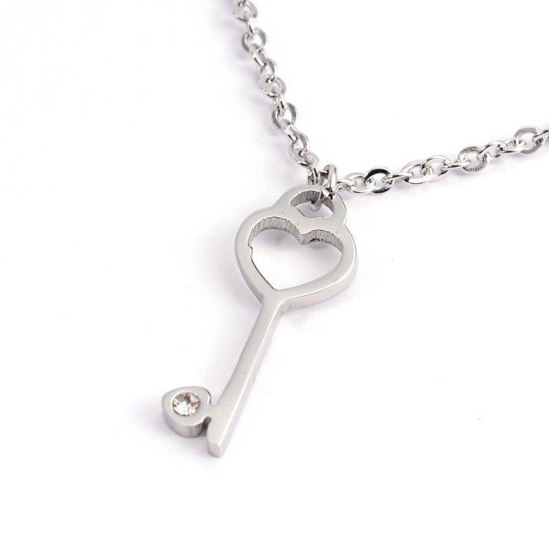 Cadenita de ACERO INOX con dije de CORAZON con LLAVE